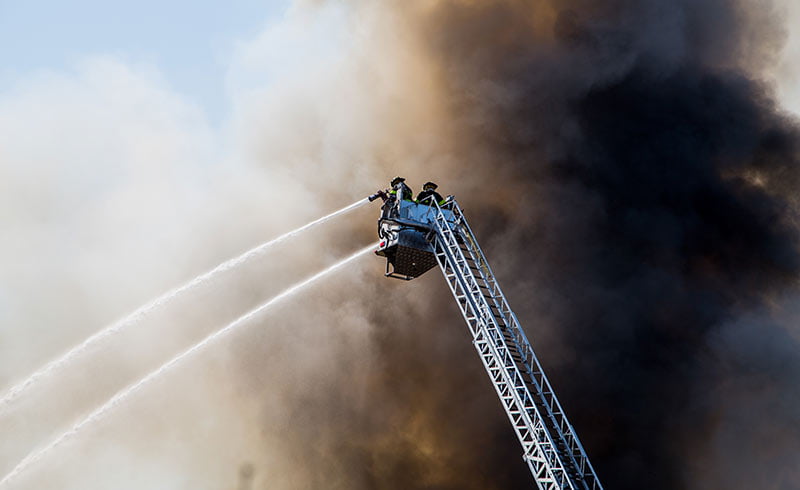 Firemen on ladder