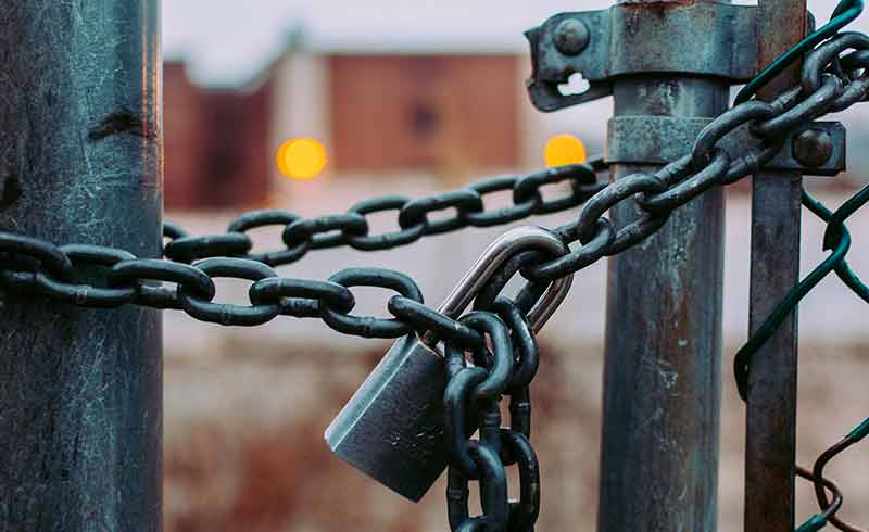 Security pad lock on fence